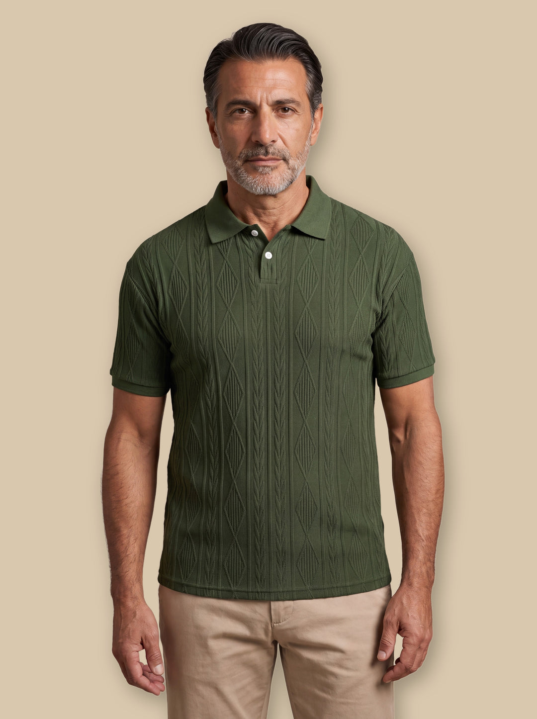 Darby polo shirt in Green, worn by a model on a warm sand studio background - Gentlemens Manor