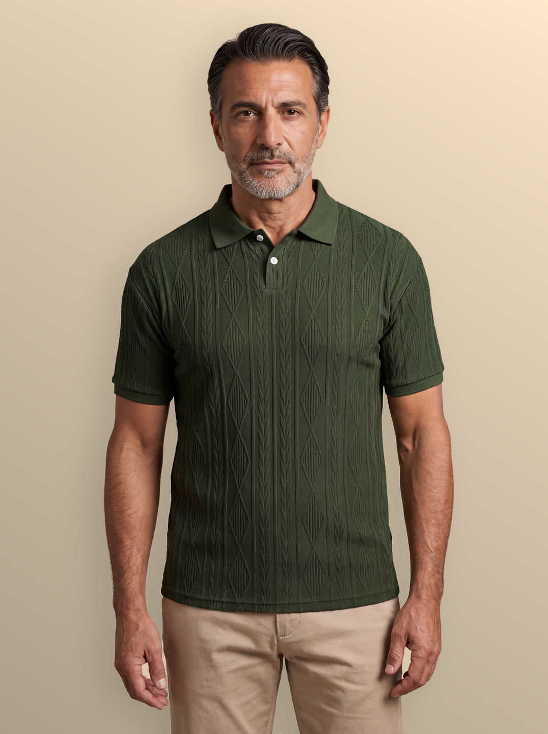 Darby polo shirt in Olive, worn by a model on a warm sand studio background - Gentlemens Manor