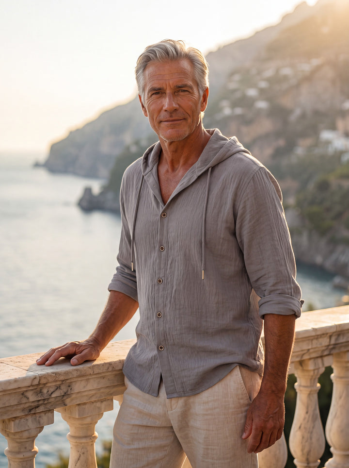 Dawson Men linen shirt in Grey, worn by a model on a Mediterranean terrace - Gentlemens Manor lifestyle