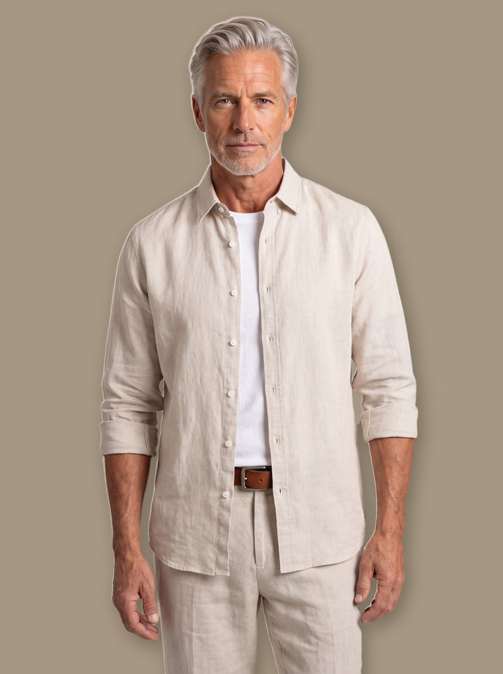 Dean linen shirt in Sand, worn by a model on a warm taupe studio background - Gentlemens Manor