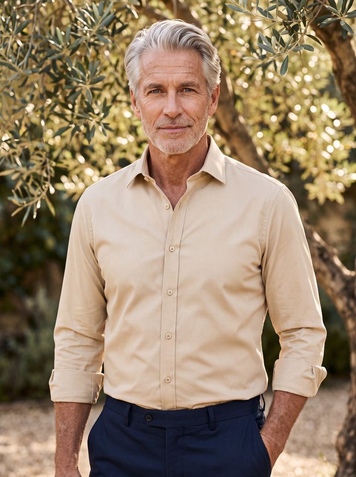 Desmond shirt in Beige, worn by a model in a Mediterranean setting - Gentlemens Manor lifestyle