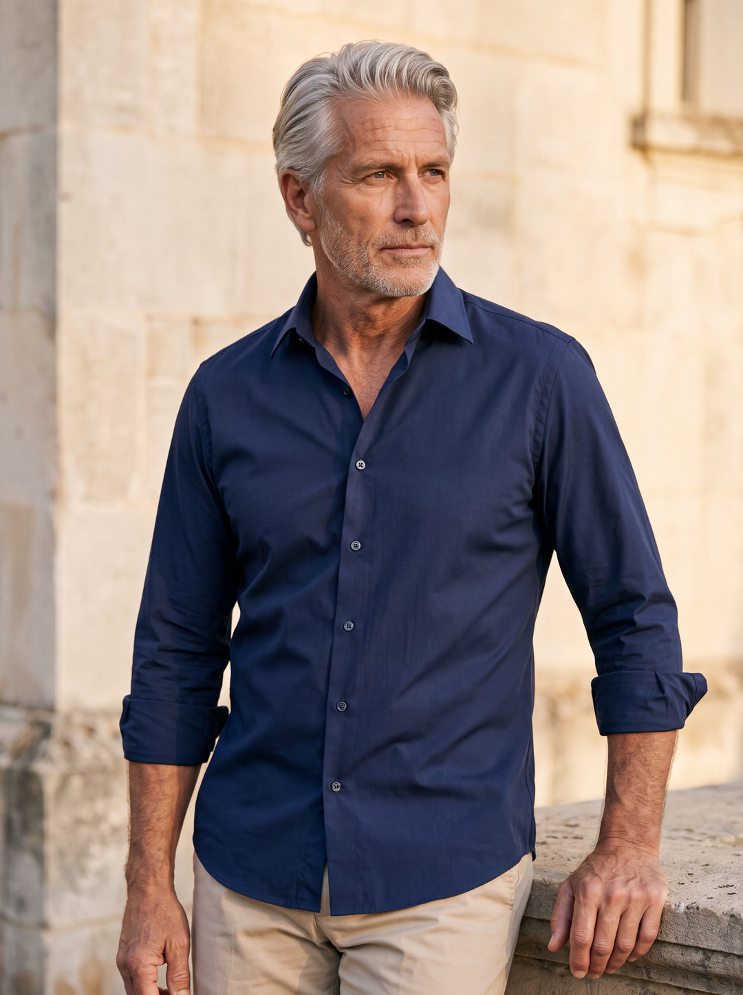 Desmond shirt in Navy, worn by a model in a Mediterranean setting - Gentlemens Manor lifestyle