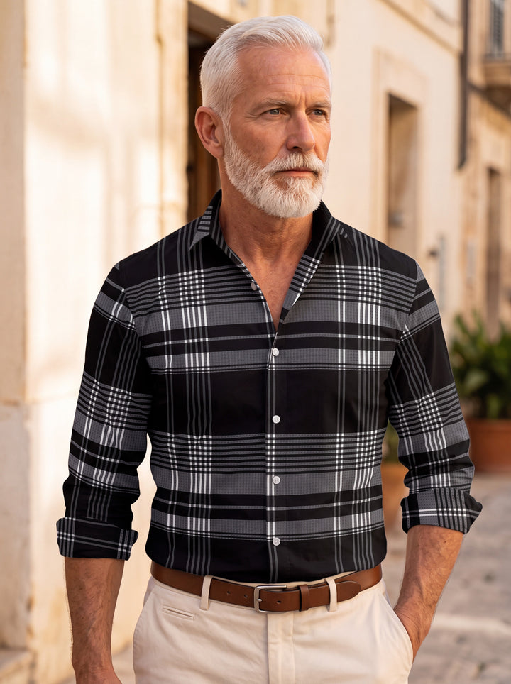 Dexter shirt in Black, worn by a model in a Mediterranean setting - Gentlemens Manor lifestyle