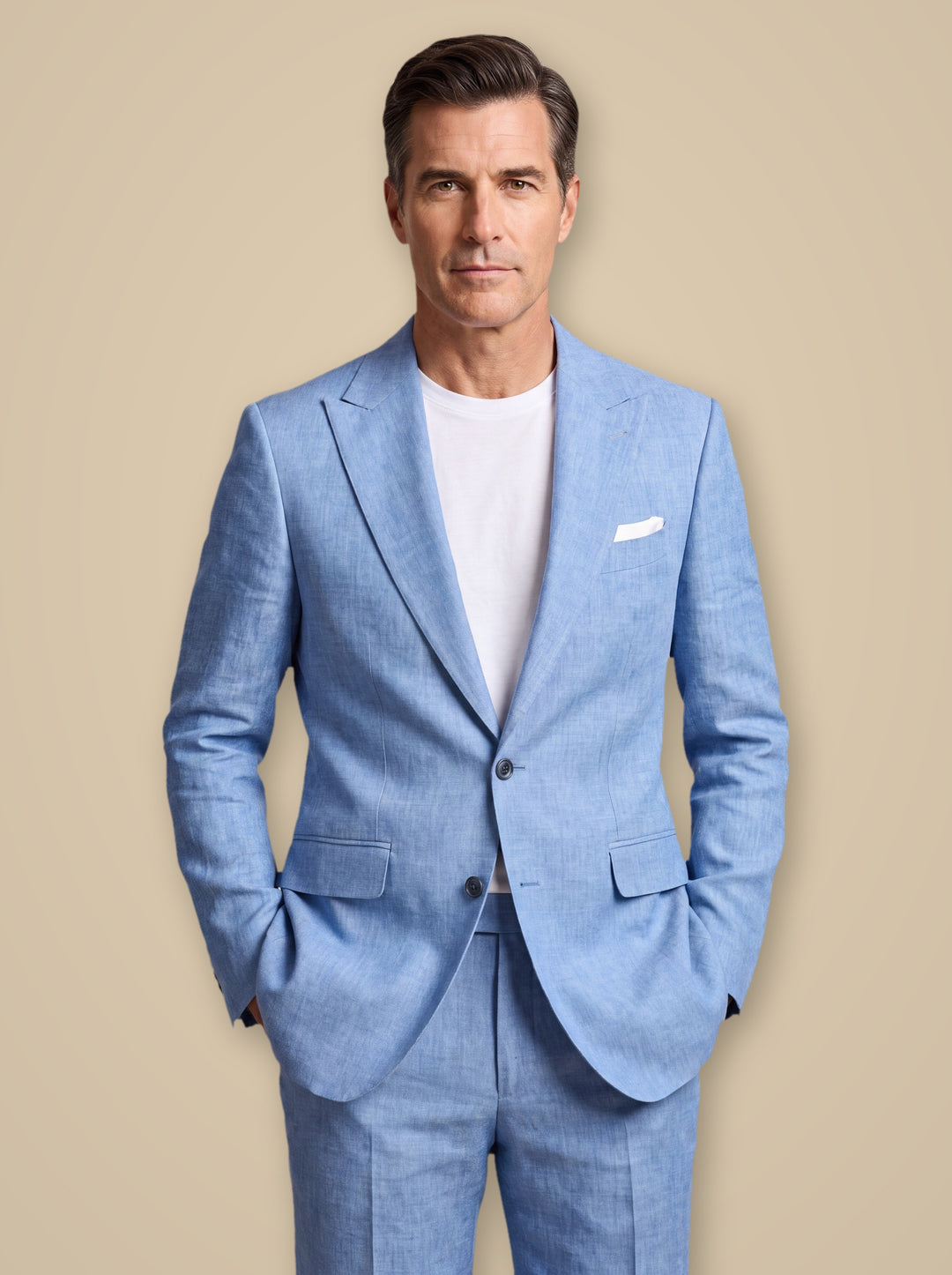 Douglas blazer suit in Light Blue, worn by a model on a warm taupe studio background - Gentlemens Manor