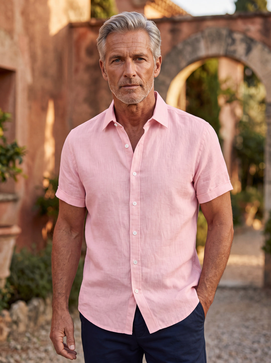 Douglas shirt in Pink, worn by a model in a Mediterranean setting - Gentlemens Manor lifestyle