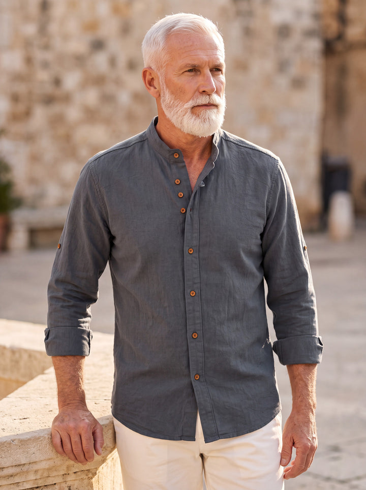 Duncan shirt in Charcoal, worn by a model in a Mediterranean setting - Gentlemens Manor lifestyle
