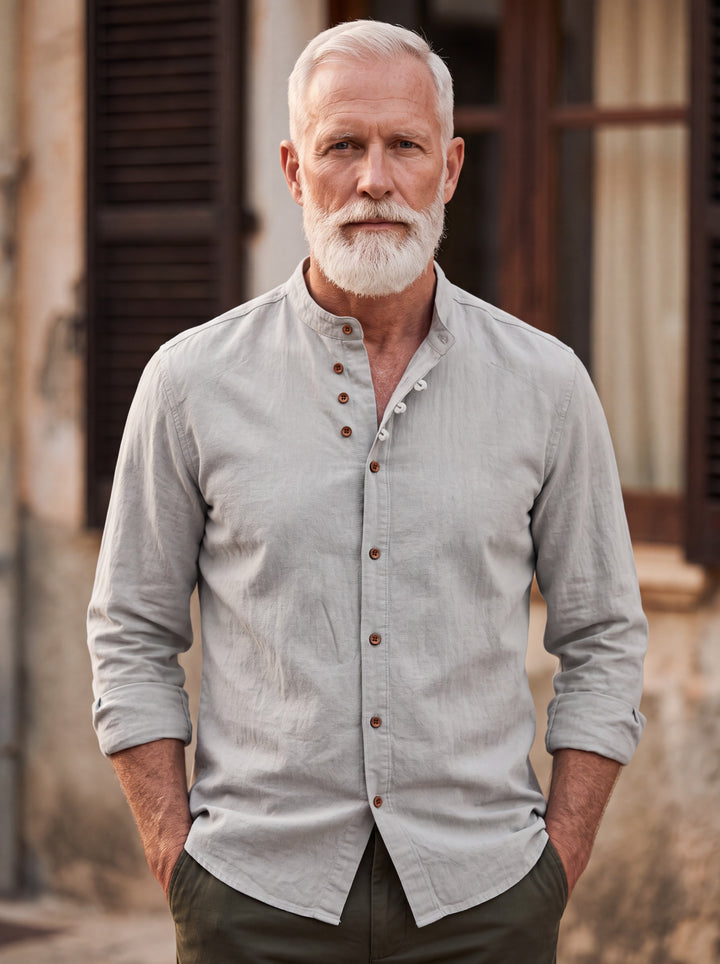 Duncan shirt in Light Grey, worn by a model in a Mediterranean setting - Gentlemens Manor lifestyle