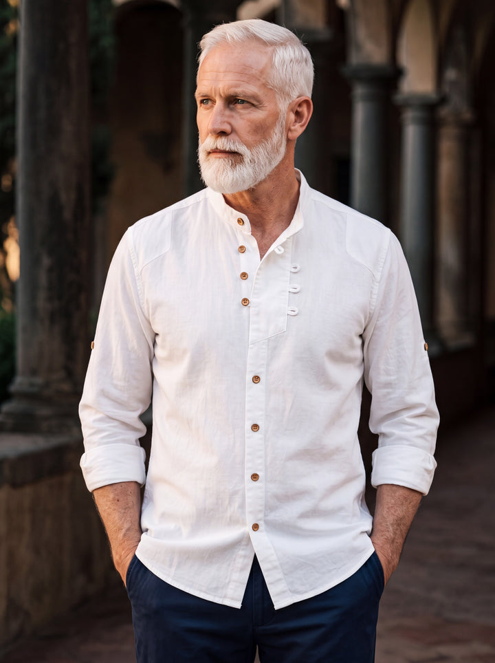 Duncan shirt in White, worn by a model in a Mediterranean setting - Gentlemens Manor lifestyle