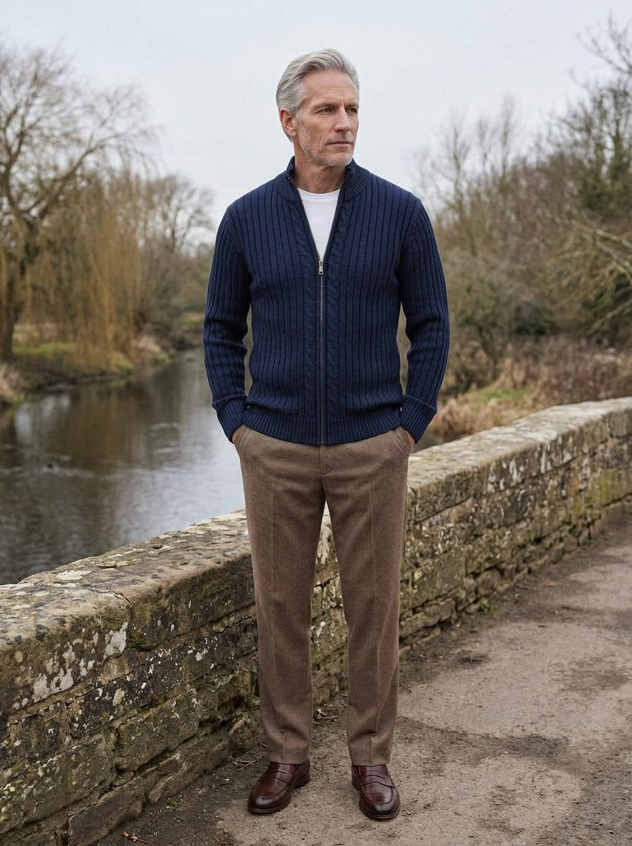 Dunstan ribbed zip cardigan in Navy, lifestyle on a stone footbridge, Gentlemens Manor
