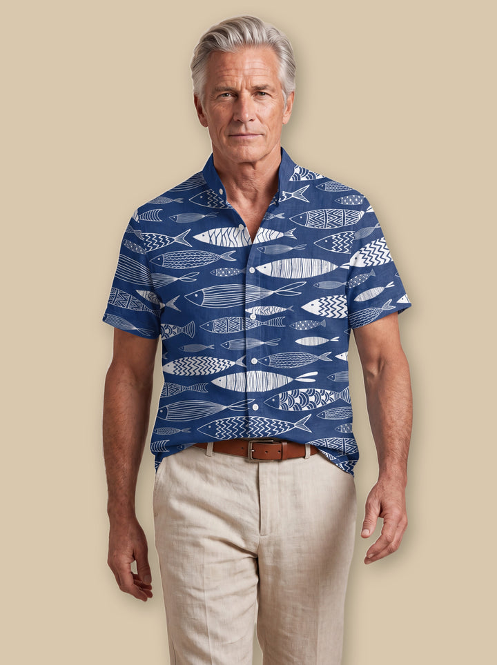 Dwight beach shirt in Navy, worn by a model on a warm sand studio background - Gentlemens Manor