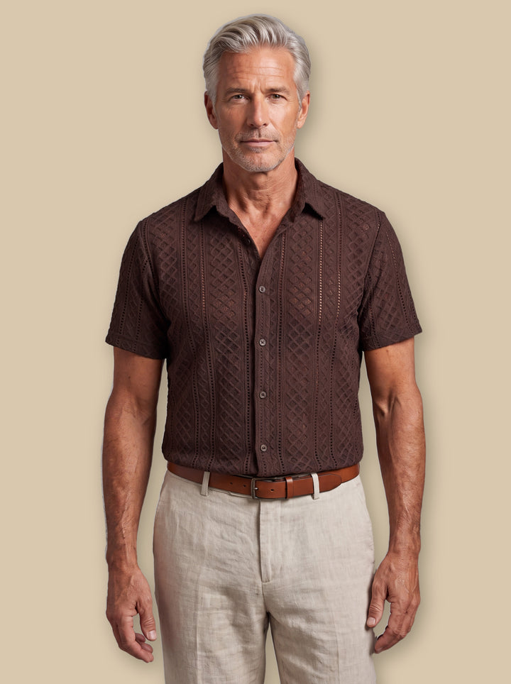 Earl casual shirt in Dark Brown, worn by a model on a warm sand studio background - Gentlemens Manor