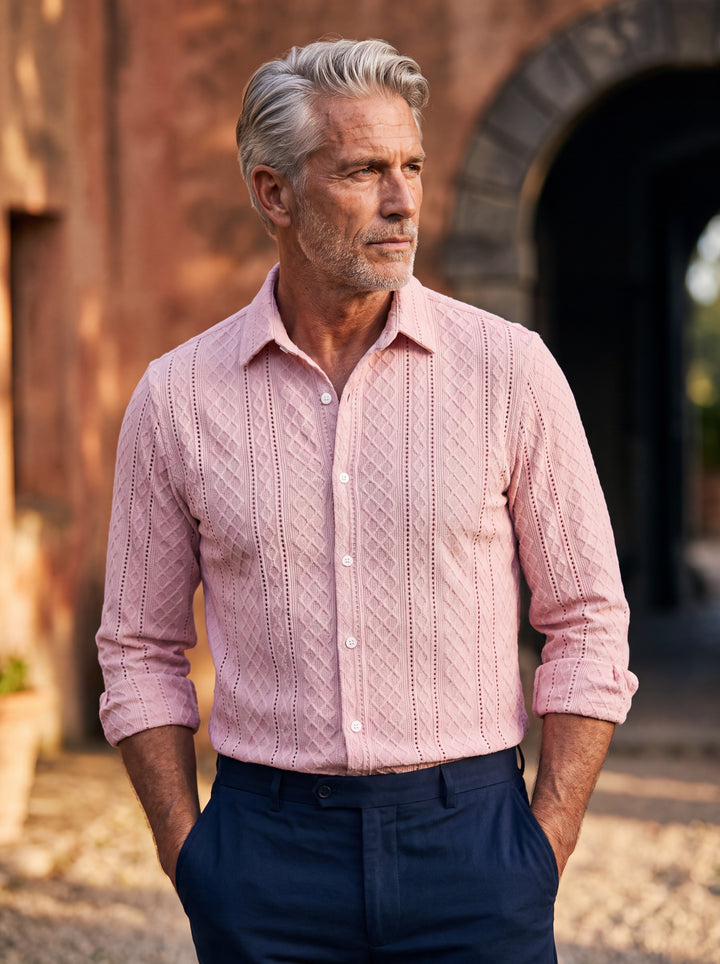 Earl shirt in Pink, worn by a model in a Mediterranean setting - Gentlemens Manor lifestyle