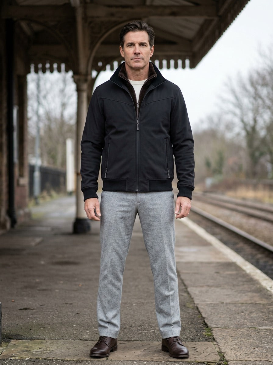 Easton bomber jacket in Black, lifestyle on a railway platform, Gentlemens Manor