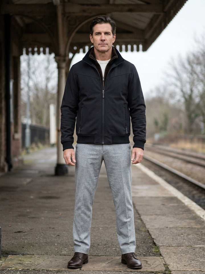 Easton bomber jacket in Black, lifestyle on a railway platform, Gentlemens Manor