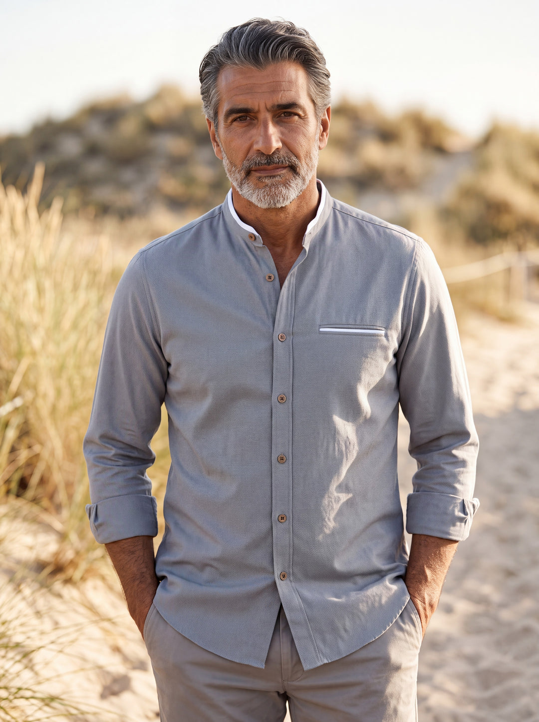 Edgar shirt in Grey, worn by a model in a Mediterranean setting - Gentlemens Manor lifestyle