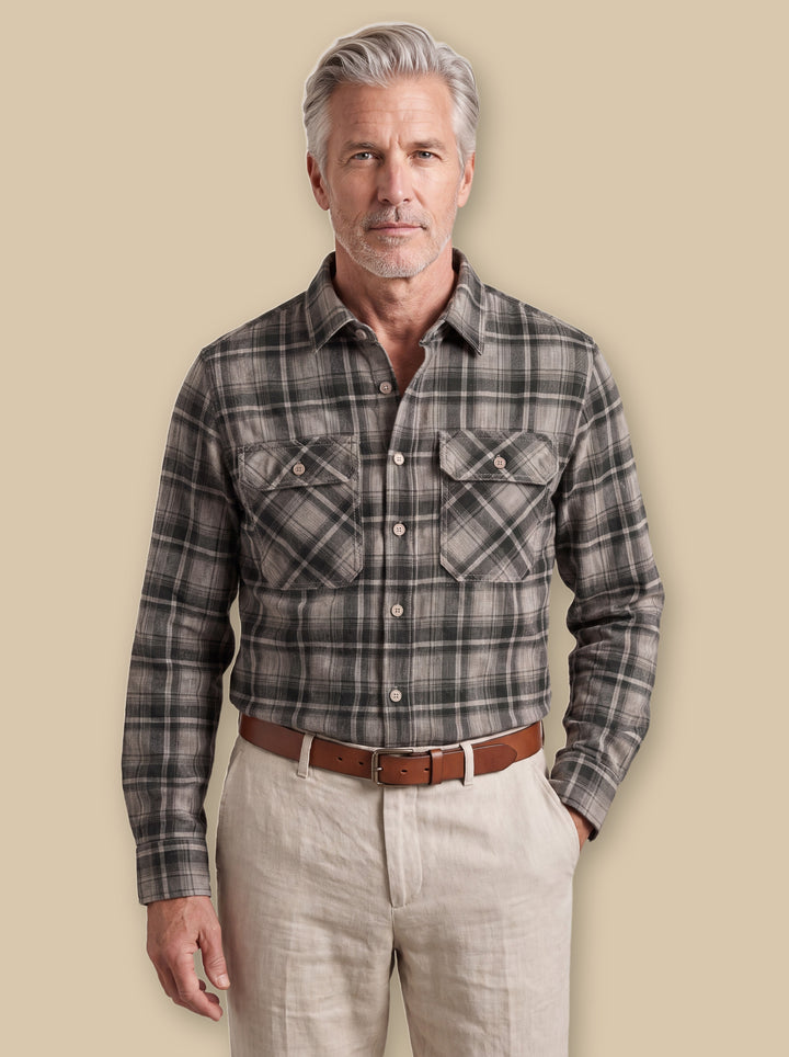 Edison casual shirt in Charcoal, worn by a model on a warm sand studio background - Gentlemens Manor