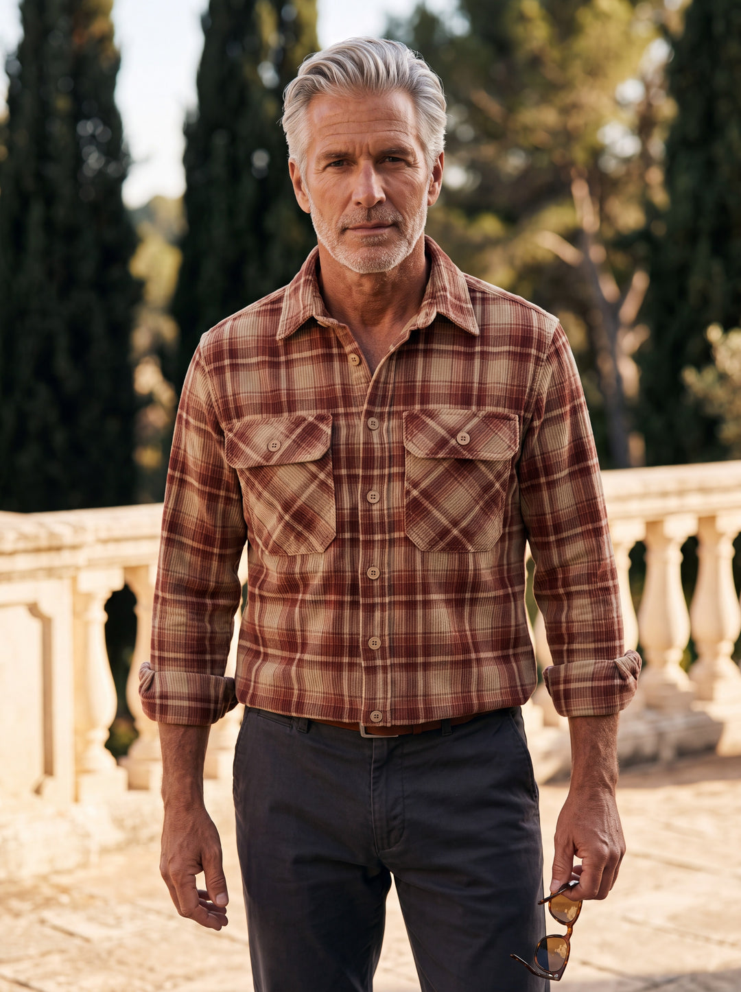 Edison shirt in Red, worn by a model in a Mediterranean setting - Gentlemens Manor lifestyle
