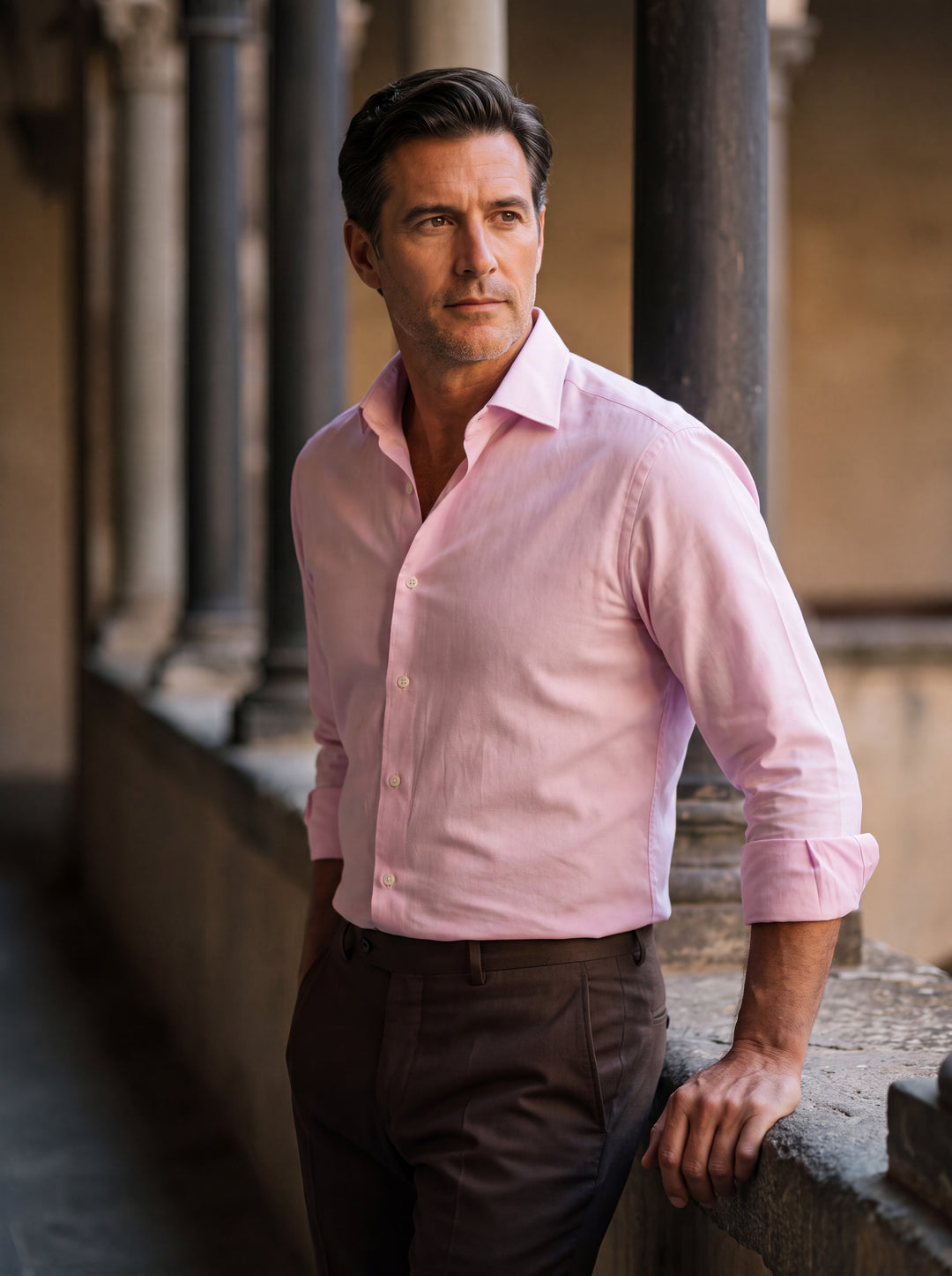 Elijah shirt in Pink, worn by a model in a Mediterranean setting - Gentlemens Manor lifestyle