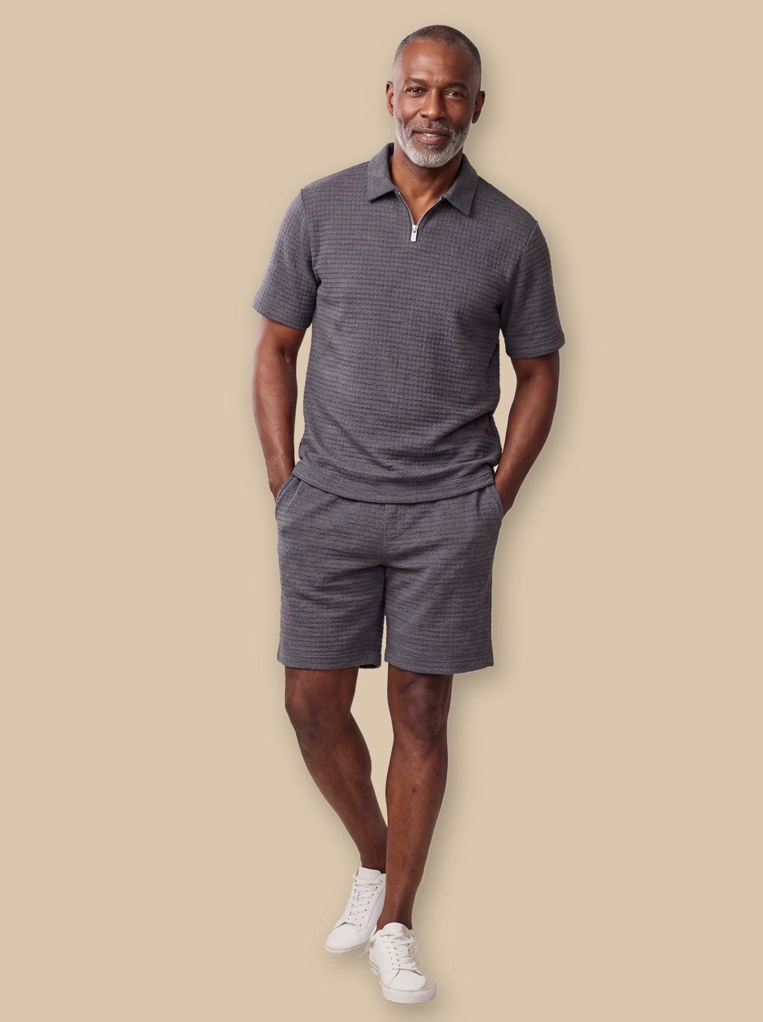 Ellis two piece set in Charcoal, worn by a model on a warm sand studio background - Gentlemens Manor