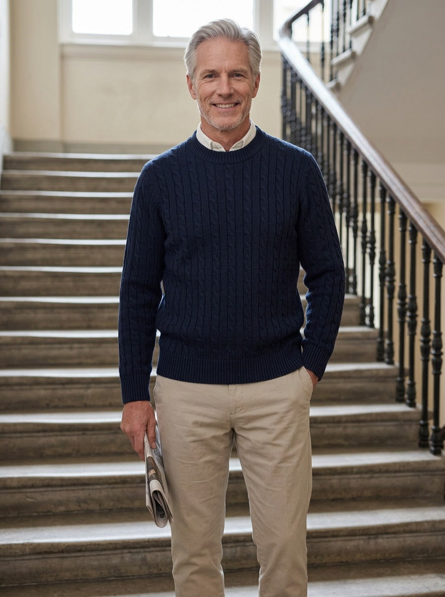 Ellison cable knit sweater in Navy, lifestyle on a civic stone staircase, Gentlemens Manor
