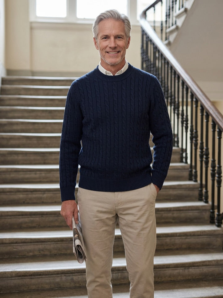 Ellison cable knit sweater in Navy, lifestyle on a civic stone staircase, Gentlemens Manor