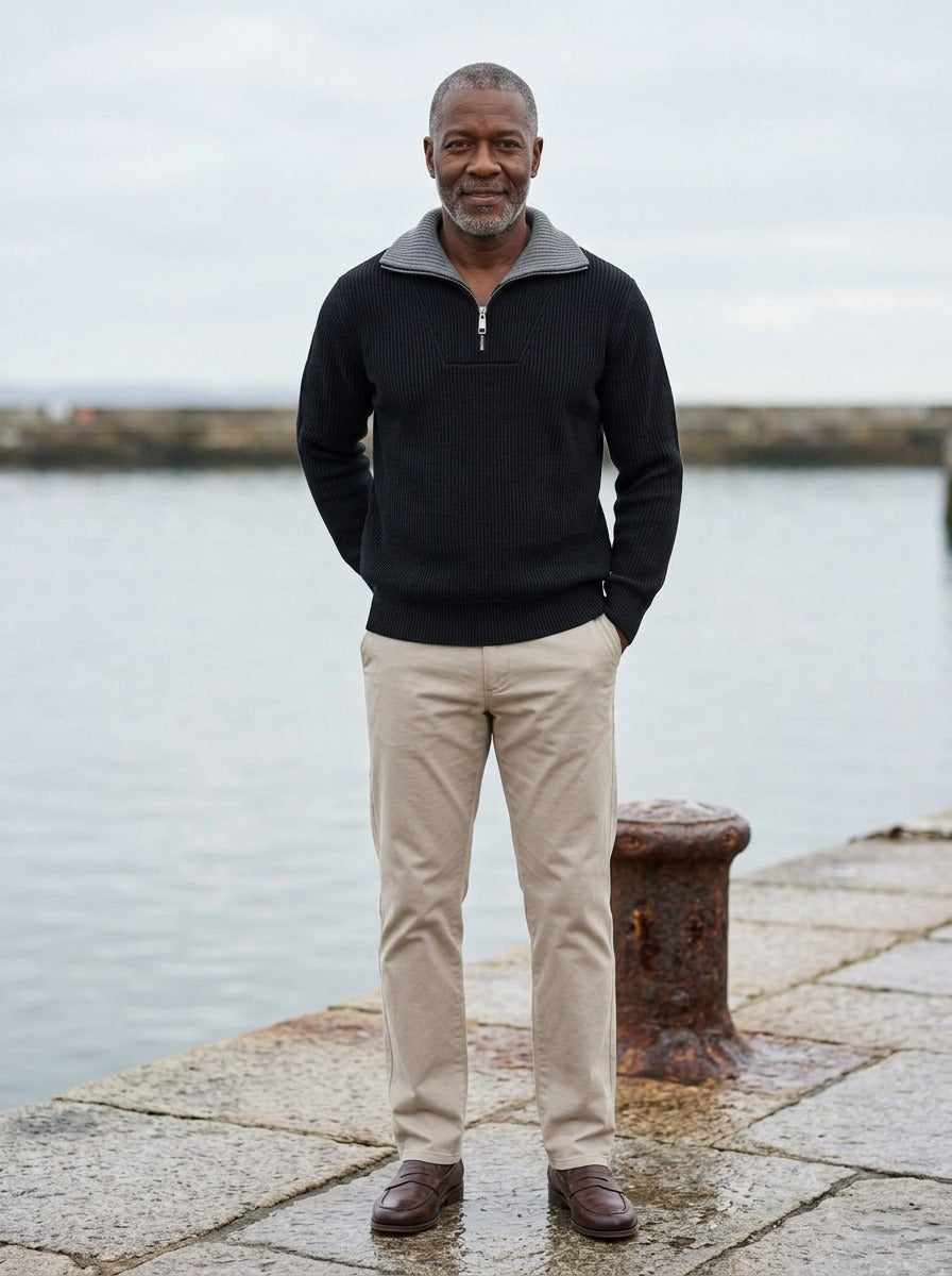 Elmhurst quarter zip sweater in Black, lifestyle on a stone harbor quay, Gentlemens Manor