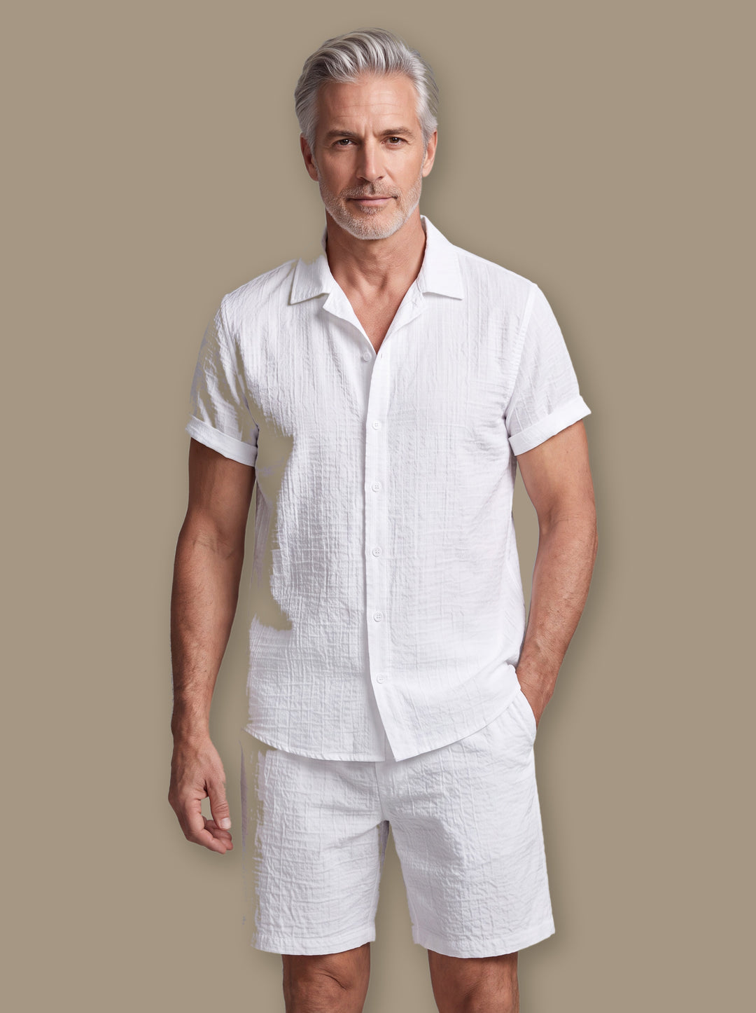 Emmett beach shirt in White, worn by a model on a warm taupe studio background - Gentlemens Manor