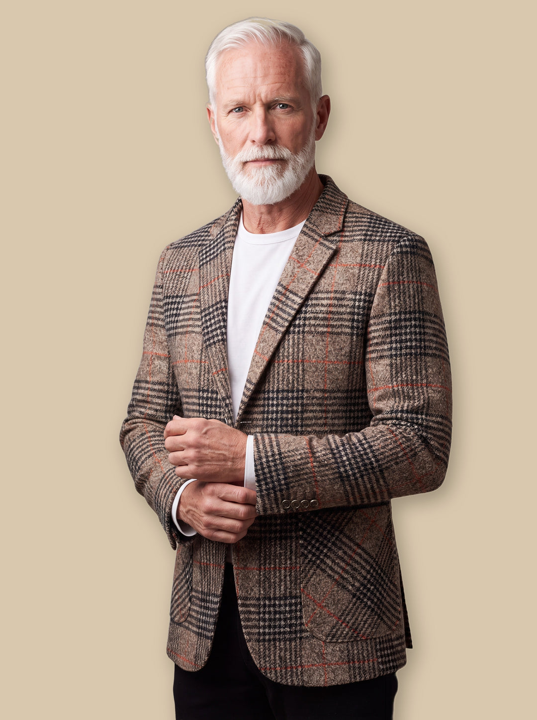 Ernest blazer suit in Brown, worn by a model on a warm sand studio background - Gentlemens Manor