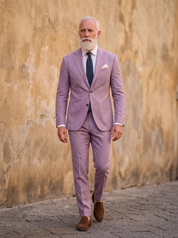 Eugene Men two-piece suit in purple, worn by a model in a Mediterranean setting - Gentlemens Manor lifestyle