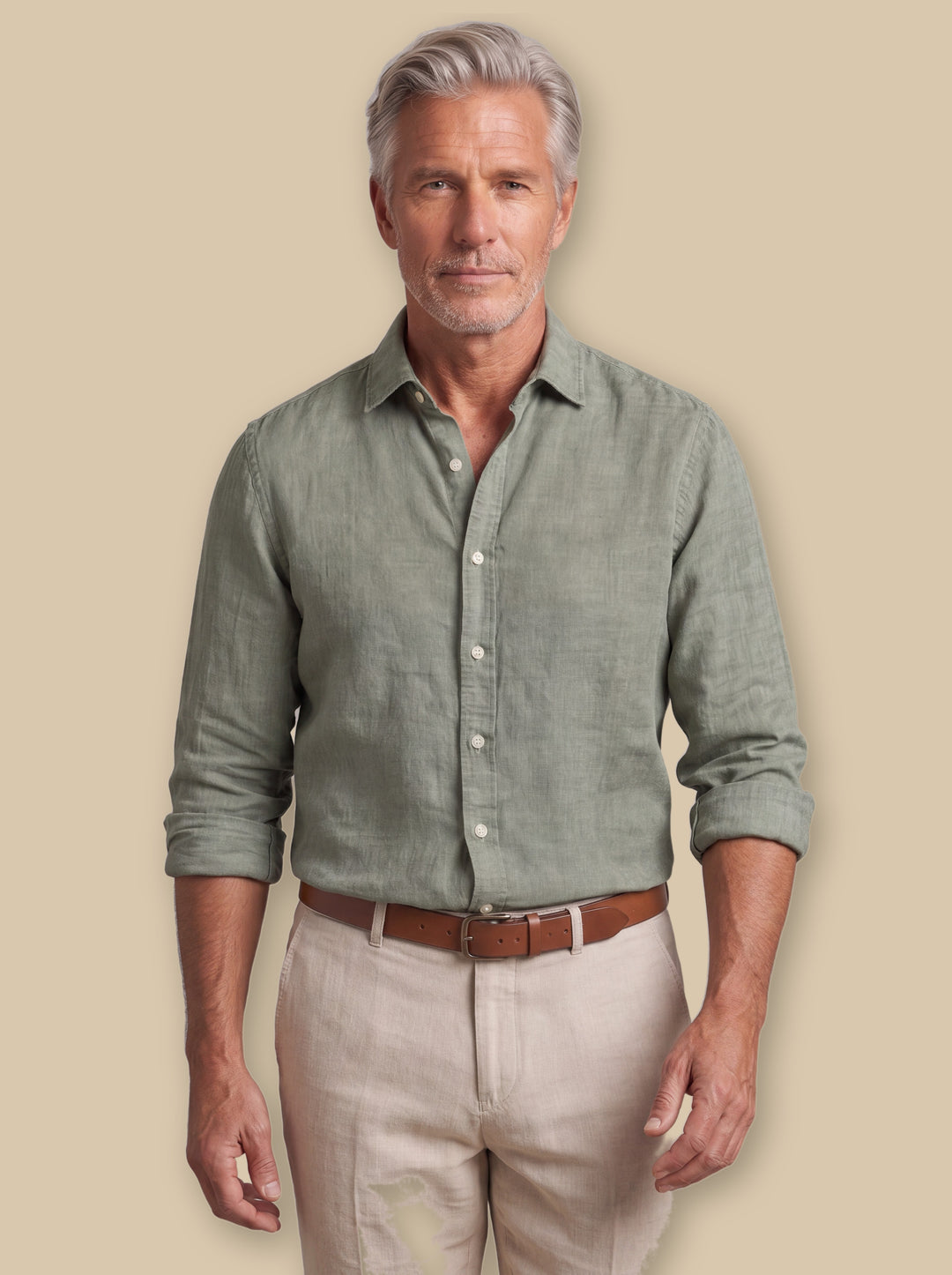 Everett linen shirt in Olive, worn by a model on a warm sand studio background - Gentlemens Manor