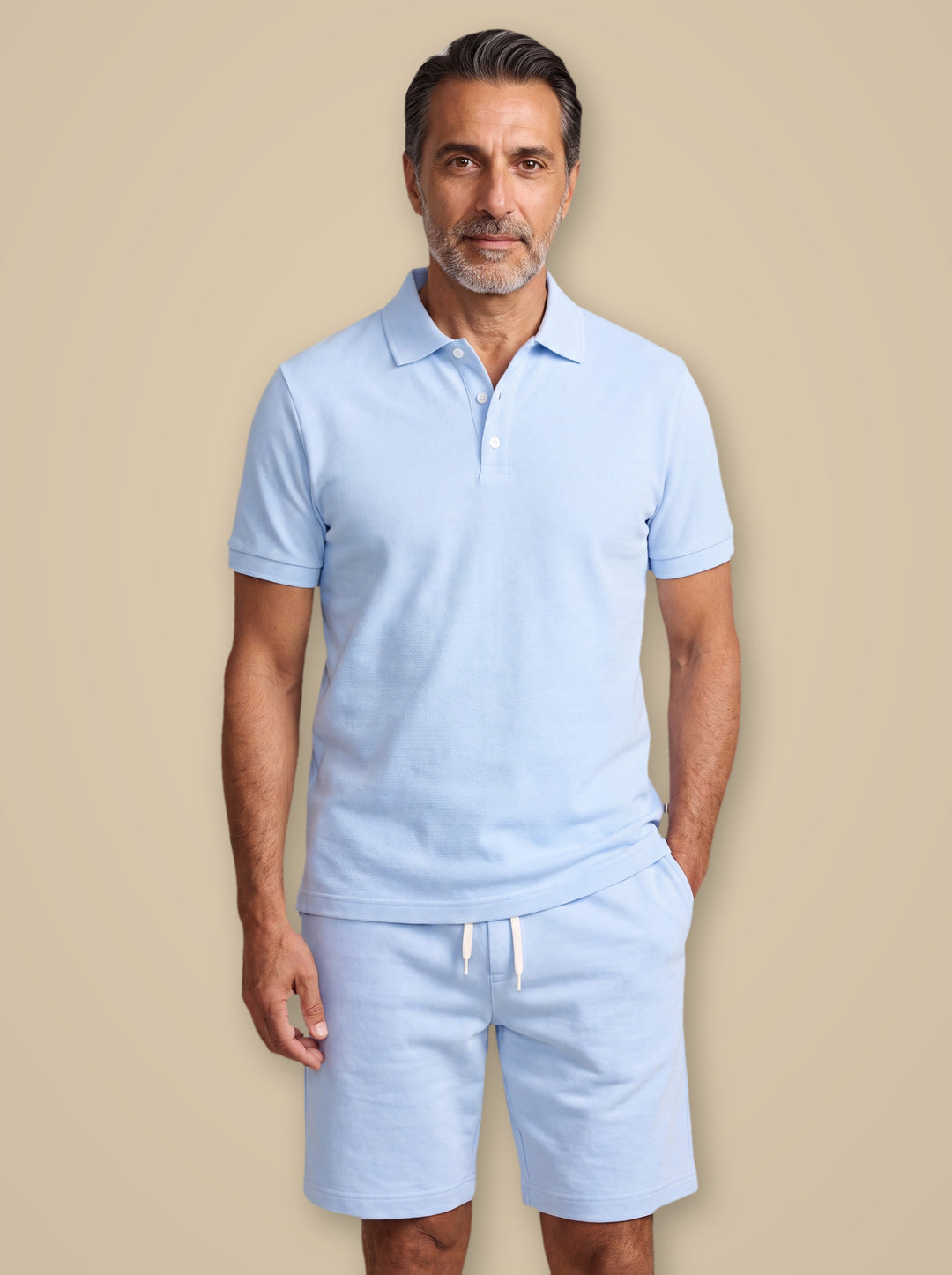 Fabian two piece set in Light Blue, worn by a model on a warm taupe studio background - Gentlemens Manor