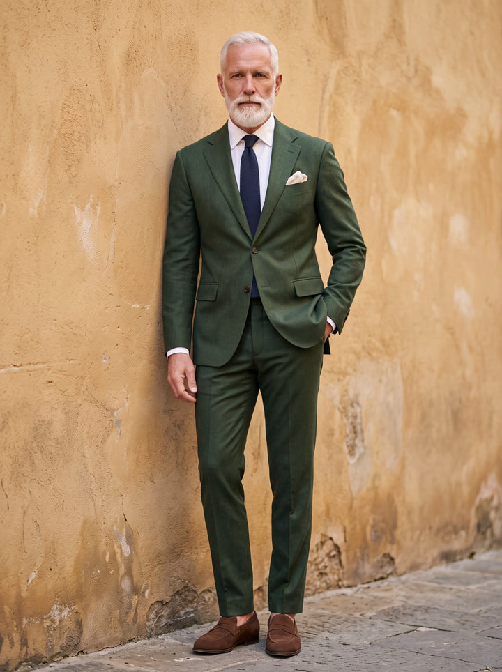 Fitzgerald Men two-piece suit in green, worn by a model in a Mediterranean setting - Gentlemens Manor lifestyle