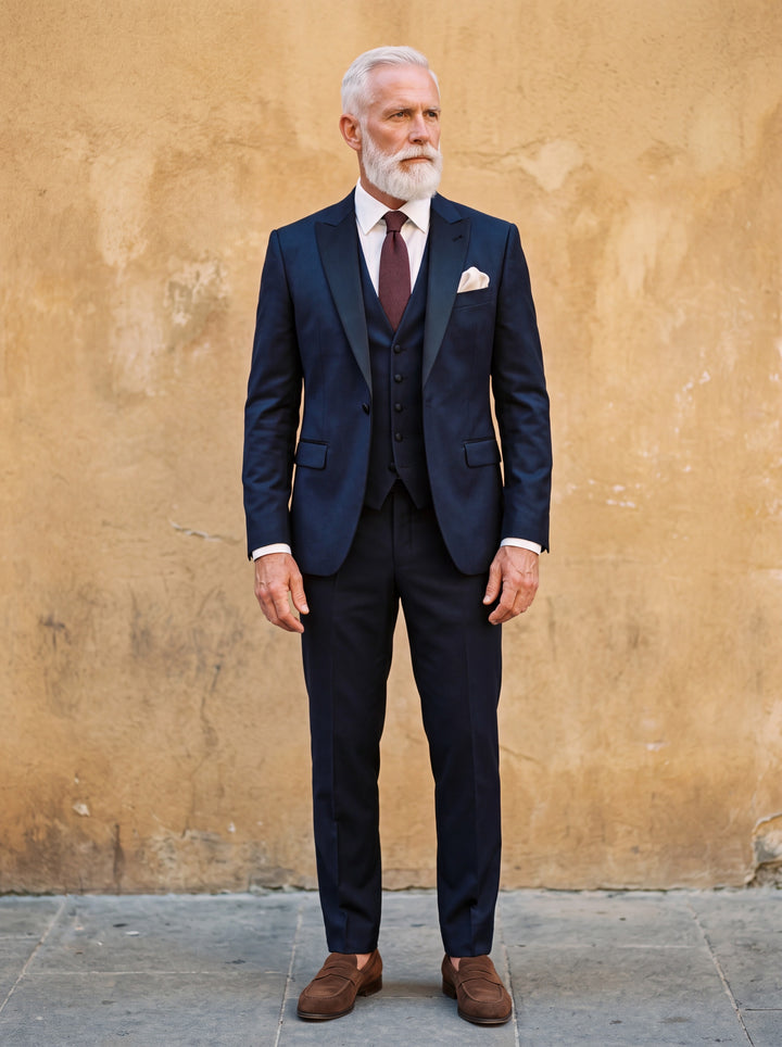 Floyd Men three-piece suit in navy, worn by a model in a Mediterranean setting - Gentlemens Manor lifestyle