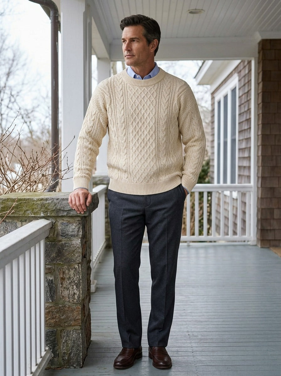 Forbes cable knit crew sweater in Cream, lifestyle on a covered porch, Gentlemens Manor
