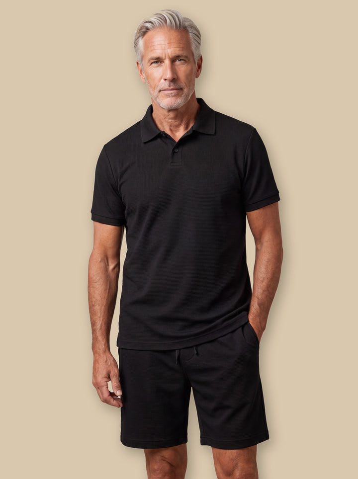 Forrest two piece set in Black, worn by a model on a warm sand studio background - Gentlemens Manor