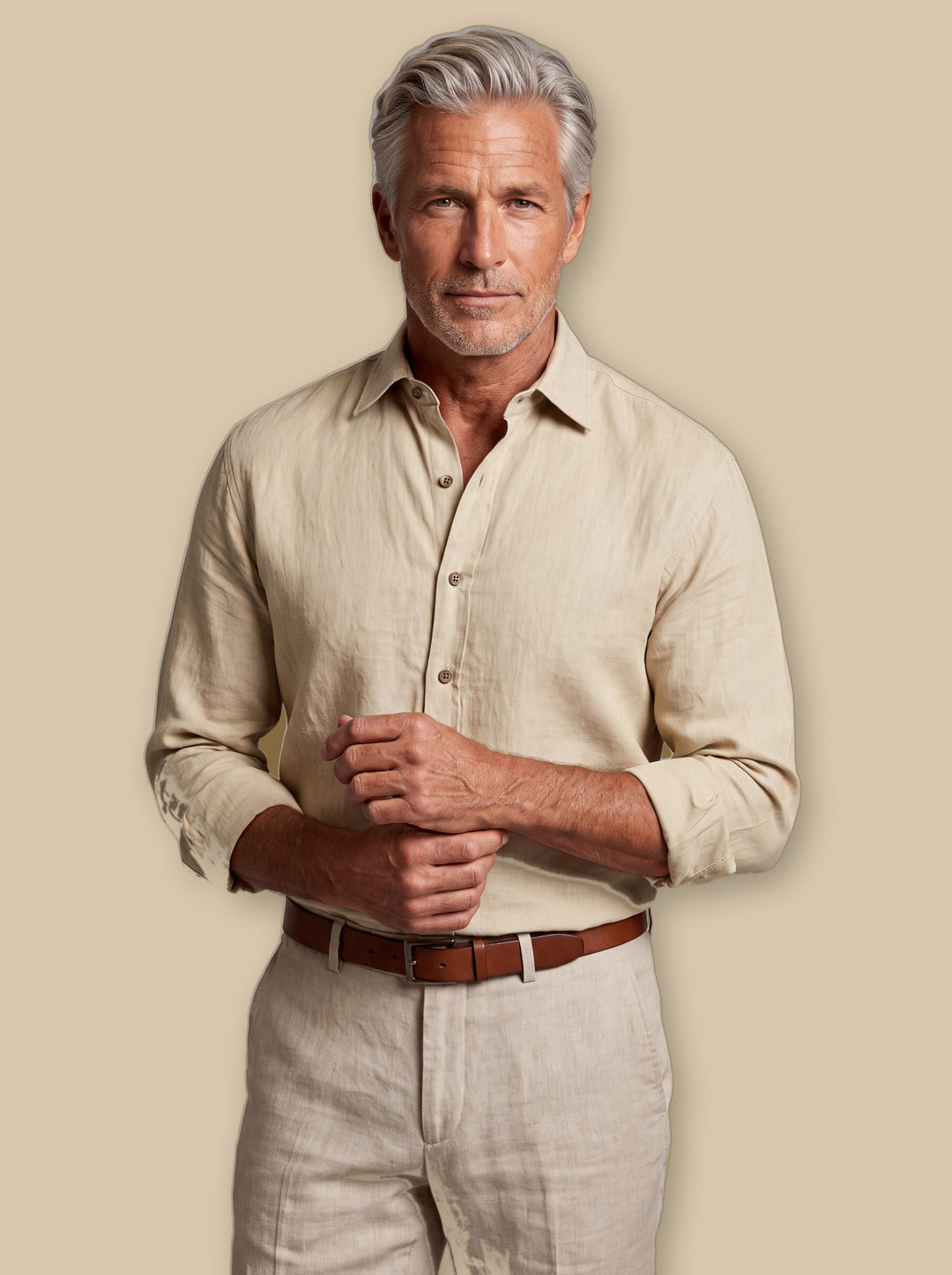 Forsyth linen shirt in Mustard, worn by a model on a warm sand studio background - Gentlemens Manor