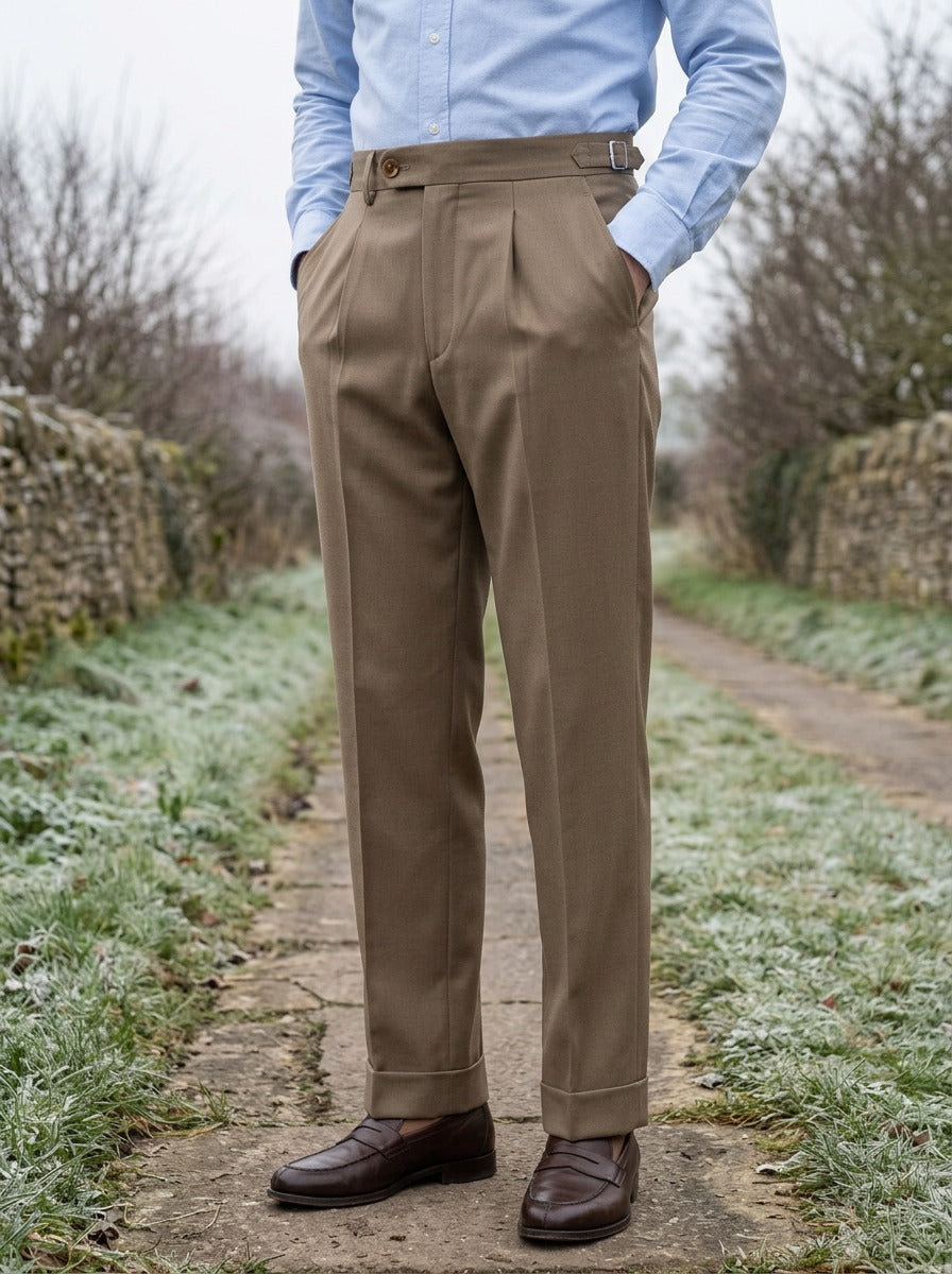 Fowler side adjuster high waist trousers in Brown, lifestyle on a country lane, Gentlemens Manor