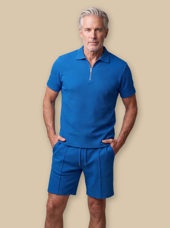 Freeman two piece set in Blue, worn by a model on a warm sand studio background - Gentlemens Manor