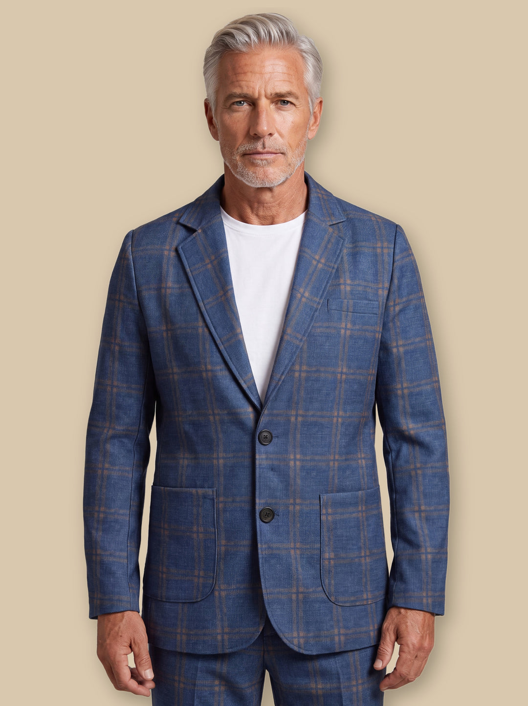 Fulton blazer suit in Blue, worn by a model on a warm sand studio background - Gentlemens Manor