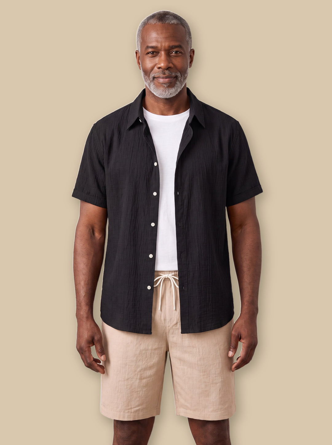 Gabriel two piece set in Black, worn by a model on a warm sand studio background - Gentlemens Manor