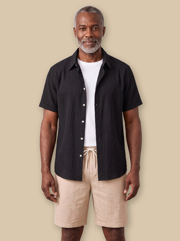 Gabriel two piece set in Black, worn by a model on a warm sand studio background - Gentlemens Manor
