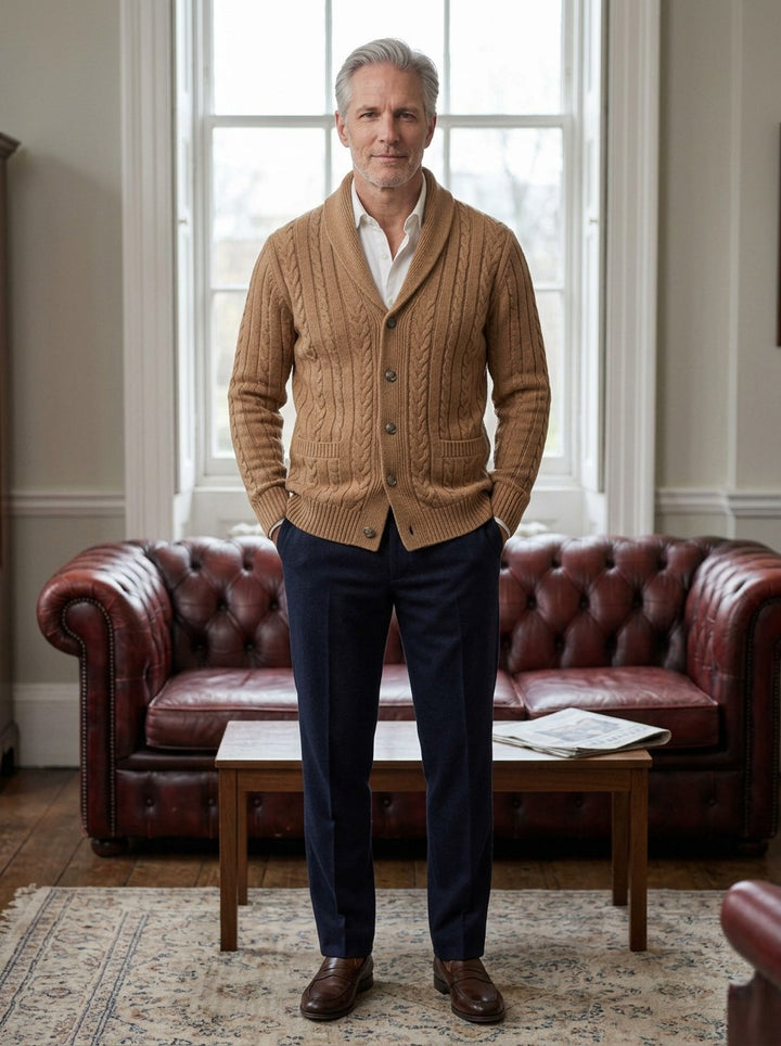 Galloway cardigan in Camel, lifestyle in a club reading room, Gentlemens Manor
