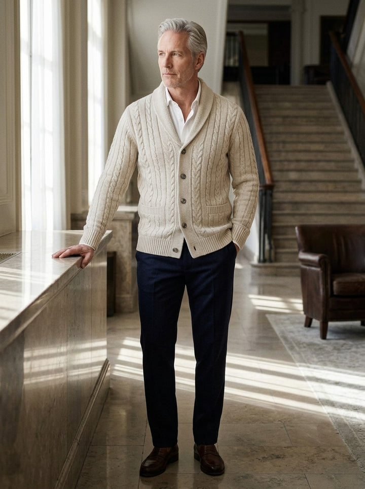 Galloway cardigan in Cream, lifestyle in a hotel lobby, Gentlemens Manor