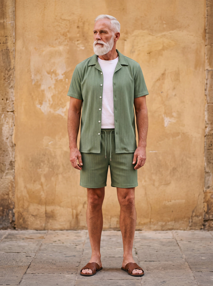 Gardner Men two-piece summer set in green, worn by a model in a Mediterranean setting - Gentlemens Manor lifestyle