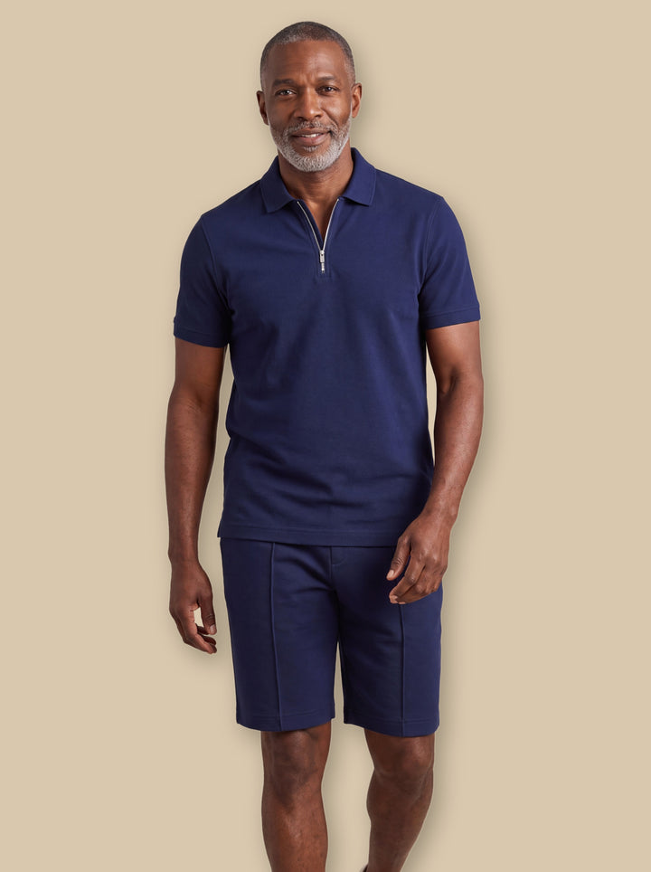 Garrett two piece set in Navy, worn by a model on a warm sand studio background - Gentlemens Manor