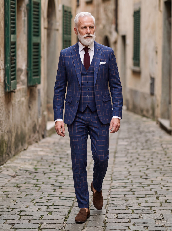 George Men three-piece suit in navy, worn by a model in a Mediterranean setting - Gentlemens Manor lifestyle