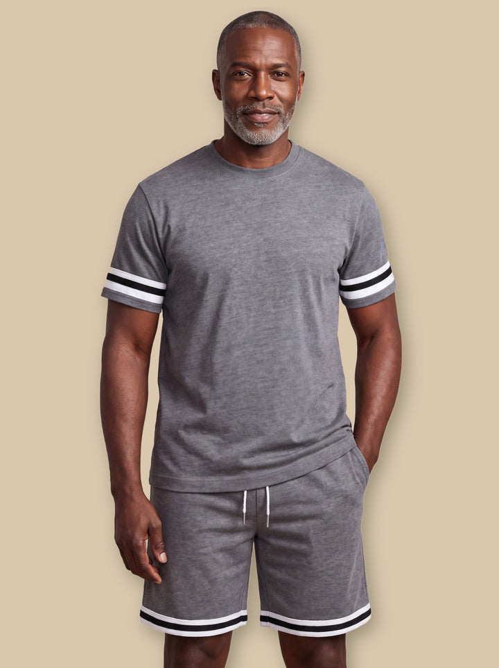 Gerald two piece set in Charcoal, worn by a model on a warm sand studio background - Gentlemens Manor