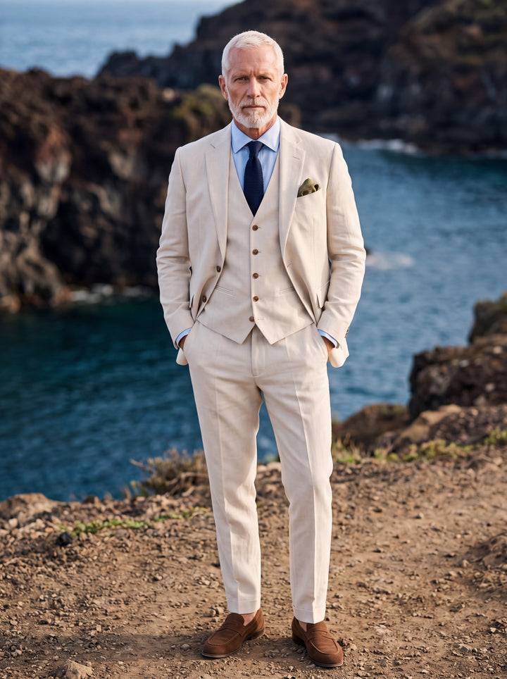 Giles Men three-piece suit in beige, worn by a model in a Mediterranean setting - Gentlemens Manor lifestyle