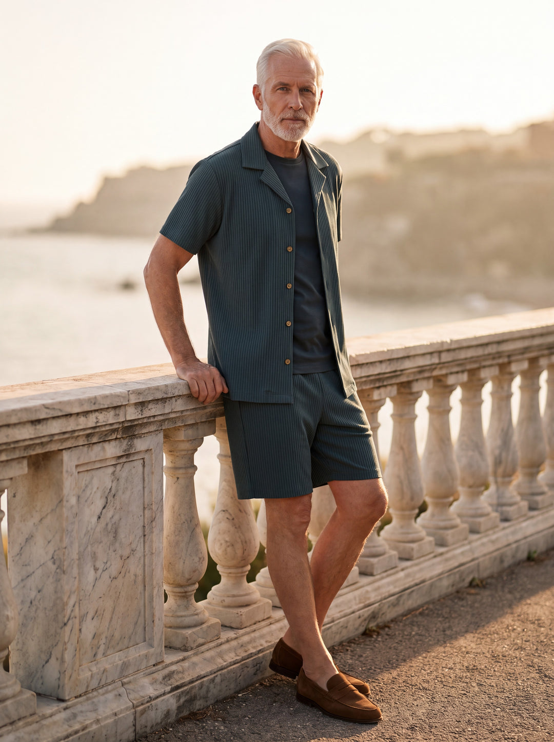 Grover Men two piece set in Grey, worn by a model on a Mediterranean terrace - Gentlemens Manor lifestyle