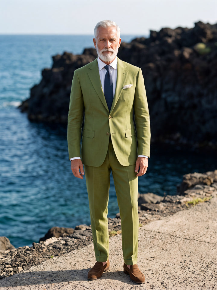Guy Men two-piece suit in green, worn by a model in a Mediterranean setting - Gentlemens Manor lifestyle